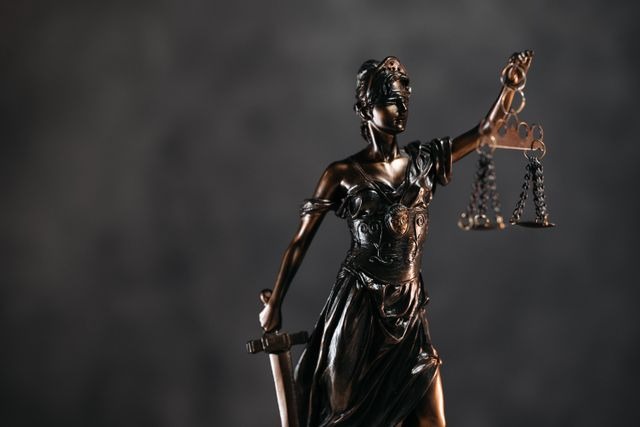 a bronze Lady Justice statue