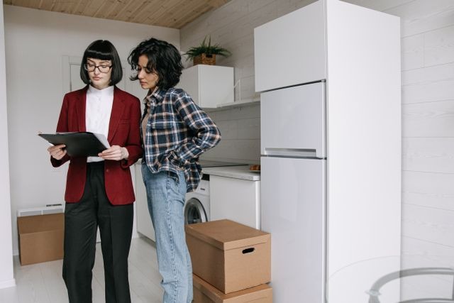 a landlord and tenant inspecting a rental