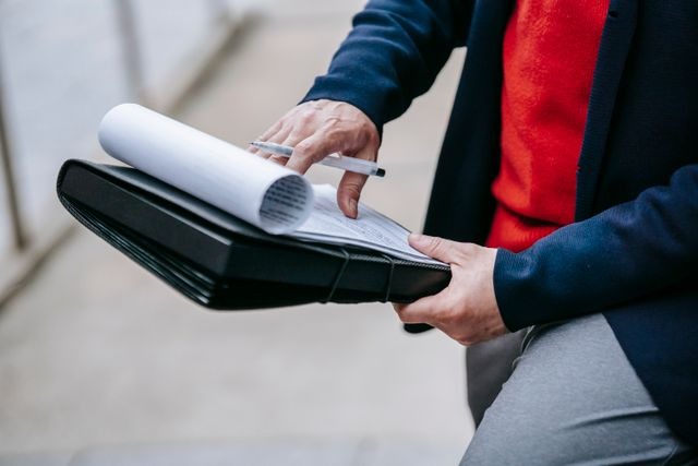 a person reviewing documentation